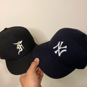 New Era Black and Dark Blue Caps